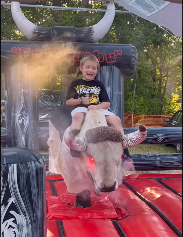Boy riding Fu Manchu the mechanical bull, click to watch the video