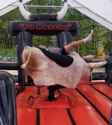 Rider falling off Fu Manchu the mechanical bull