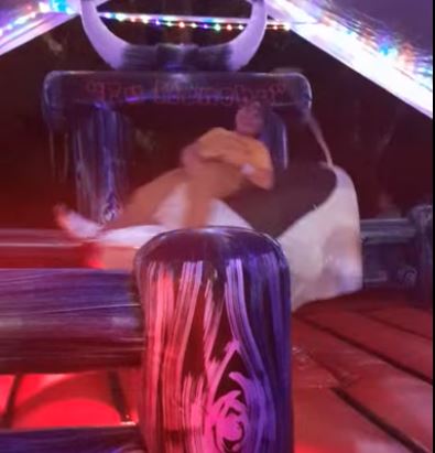 Rider on Fu Manchu the mechanical bull at night