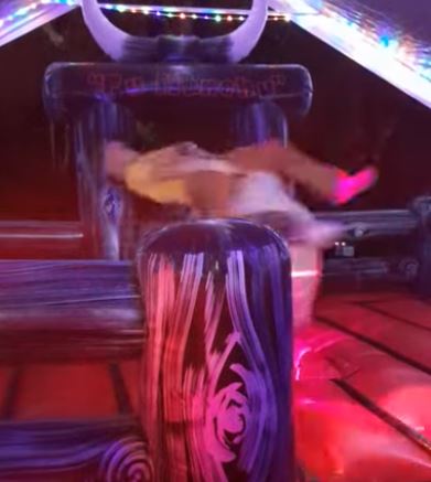 Rider on Fu Manchu the mechanical bull at night