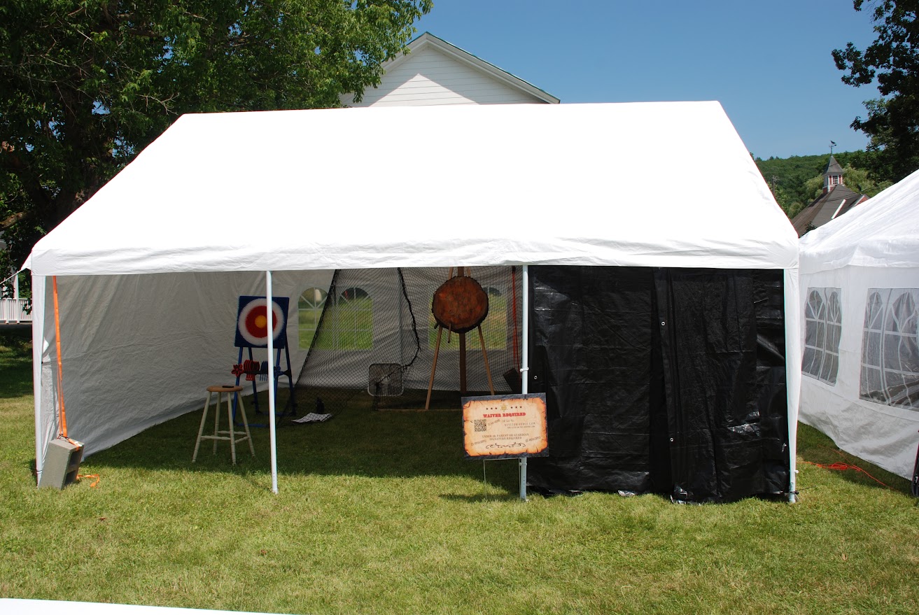 Keystone Rodeo axe throwing tent setup with target boards